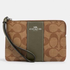 Coach Corner Zip Wristlet In Signature Canvas